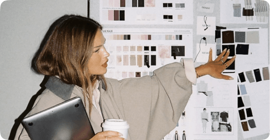Fashion designer working with portfolio